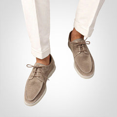 Comfortable men's deck shoes, lace-up design, offering casual style and support for warm weather activities.