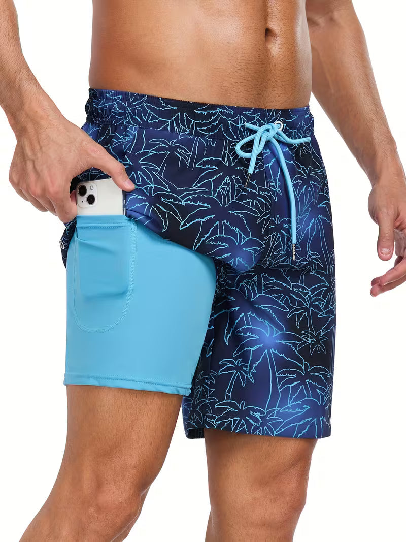 Men's blue tropical print drawstring swim shorts, perfect for beachwear & summer fun. Quick-dry men's swimwear.