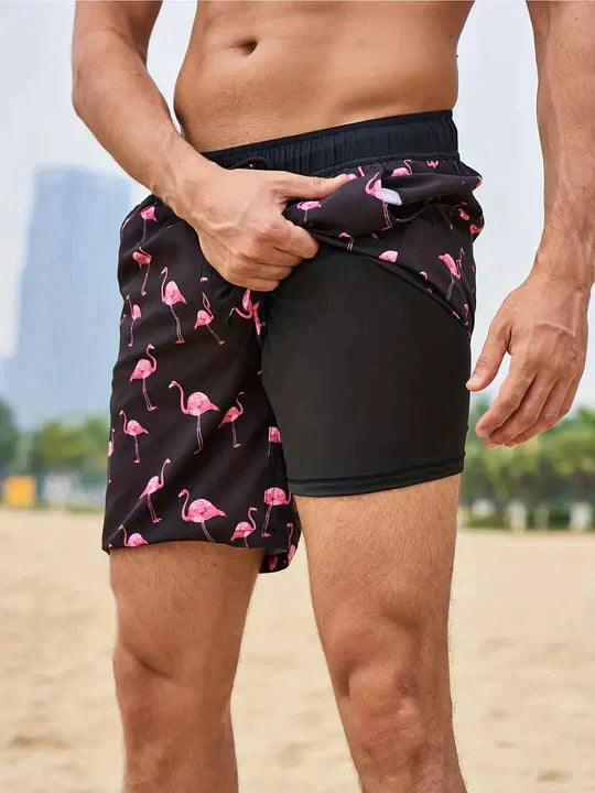 Stylish men's printed beach shorts with adjustable drawstring, ideal for poolside resort wear & vacation.