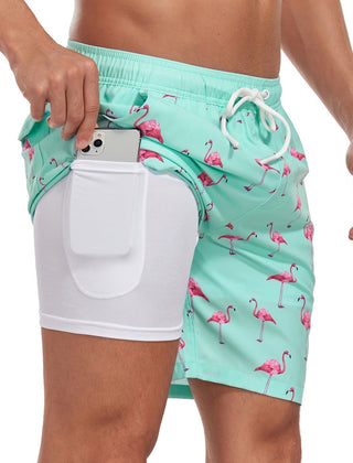 Men's quick-dry swim trunks in a stylish summer print. Perfect drawstring shorts for beach or pool.