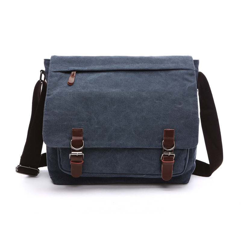 Spacious men's canvas crossbody bag, ideal for everyday carry, work, or travel, featuring durable construction.