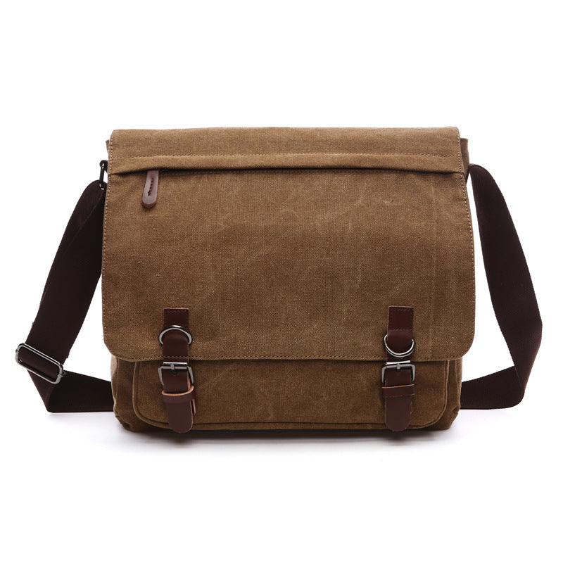 Durable men's rugged canvas shoulder bag with secure buckles, perfect for work, travel, or a stylish everyday carry.