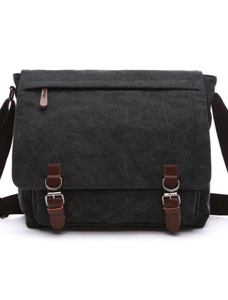 Unisex rugged canvas shoulder bag, perfect for everyday essentials, work, or travel, highlighting its sturdy material.