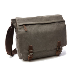 Practical men's canvas shoulder bag with adjustable strap and spacious compartments for versatile everyday and travel use.