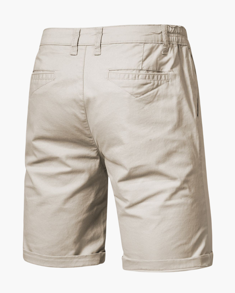 Beige men's smart casual chino shorts, comfort fit. Versatile summer shorts for everyday men's fashion.