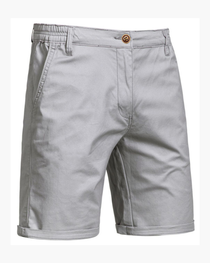 Detail of pocket on men's smart casual chino shorts. Highlighting tailored fit & quality for summer fashion.